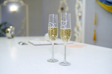 Photo of decorated wedding glasses