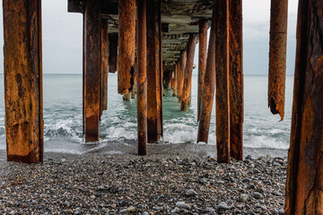Old broken down pier in Alushta. Crimea