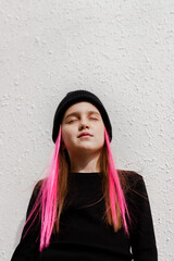 Fototapeta premium Beautiful teenage girl wear black beanie posing in city.
