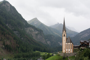 Fototapeta na wymiar A beautiful Austrian church among the mountains