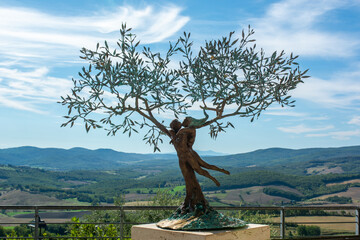 Tree in the shape of a couple in love with mountains in the background