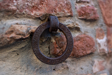 
old metal ring in the wall