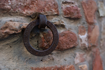 
old metal ring in the wall
