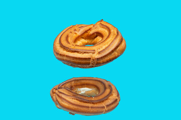 Pastry rings with cream in levitation.