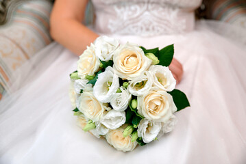 Obraz na płótnie Canvas Photo of the bride's wedding bouquet