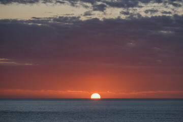 Beautiful horizon sunrise sunset dusk dawn twilight blue hour over ocean sea with sea gulls nature seascape scenery