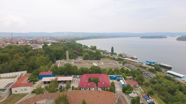 Aerial view of Medieval Citadel of Severin in Drobeta-Turnu Severin city, Romania. Footage was shot from a drone while flying forward towards the citadel on the Romanian bank of Danube river.