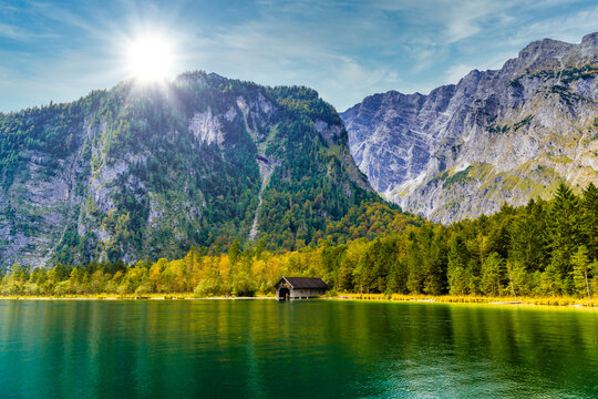 Wooden old fish house on the lake Koenigssee, Konigsee, Berchtesgaden National Park, Bavaria, Germany - Powered by Adobe