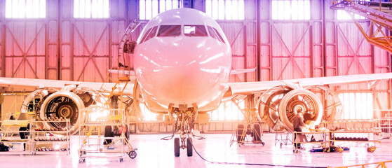 Passenger aircraft on maintenance of engine disassembled engine blades and fuselage repair in airport hangar. Format banner header wide size, place sample text. - obrazy, fototapety, plakaty