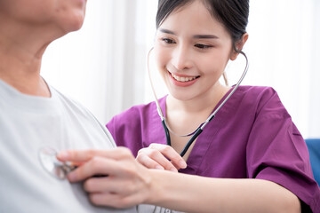 Portrait of Medical staff or Nurse looking at camera standing and smiling in Home., Home care...