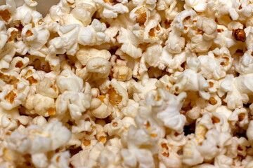 popcorn texture filling the entire frame. group of popcorn to be eaten. popcorn filling the whole frame.