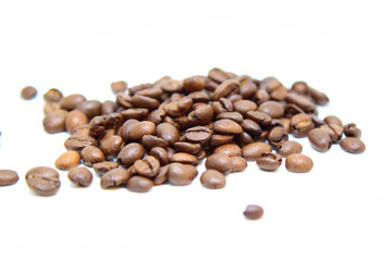Coffee beans isolated on white background. Selective focus
