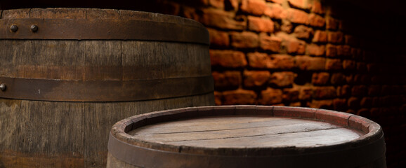 Fototapeta premium Wine casks at the winery. Stacked Wine barrels at the german winery. High quality photo