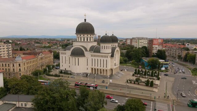 Aerial video of the Orthodox Cathedral in Arad city, Romania. The footage was shot from a drone while flying forward towards the cathedral with camera at level position.