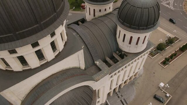 Drone footage of the Orthodox Cathedral in Arad city Romania. The video was shot from a drone while flying upwards from above the towers revealing the towns cityscape. 