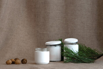 Advent Calendar for Christmas. Three white jars and nuts with. Step 4