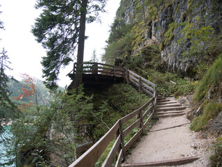 Fototapeta premium On the trails around Braies Lake in the fall. Dolomites, Italy.