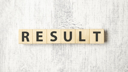 result word on wooden blocks and white background