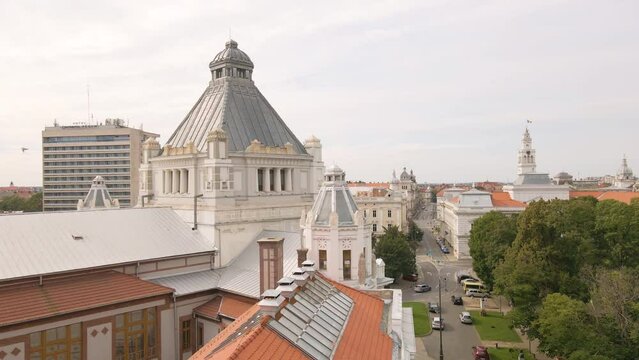Aerial footage of the back side of the Cultural palace in Arad city, Romania. Video was shoot from a drone while flying above the palaces roof banking left, with the front tower in the view.
