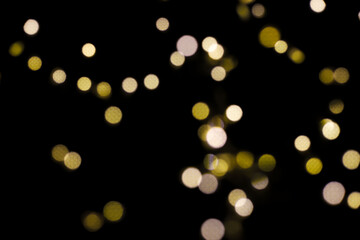 multicolored round blurred bokeh of different sizes. for postcards, signs, labels, New Year's flyers