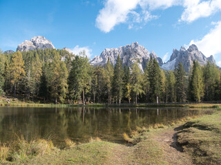 A sunny autumn day along Lake Antorno, Dolomites, Italy.