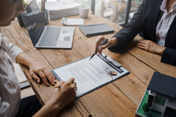 Real estate agent and customer make contract to buy and sell house and land approval of a contract...