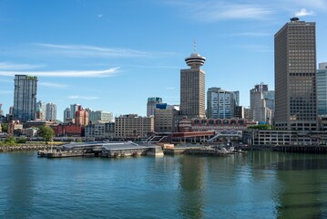 Horizontal image of the sky crepes and other buildings near the coastline in Vancouver Canada