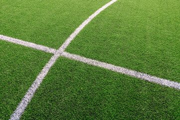 Texture of Perfect green lawn on the football field