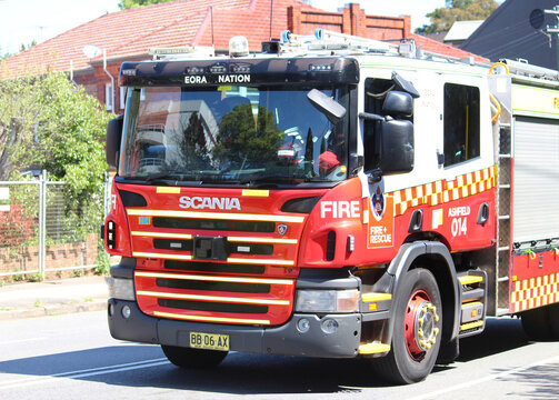 Sydney, NSW Australia - November 20 2022: NSW Fire Truck Travelling On A Road