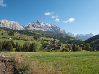 Fototapeta premium Along the meadows surrounding La Villa. Dolomites, Trentino-Alto Adige region, Italy.