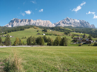 Fototapeta na wymiar Along the meadows surrounding La Villa. Dolomites, Trentino-Alto Adige region, Italy.