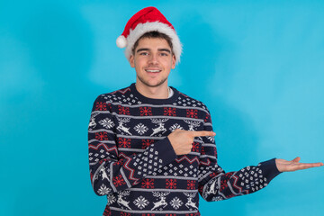 Obraz premium young teenager in christmas clothes isolated