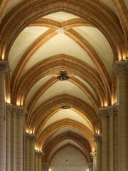 Fototapeta premium Majestic gothic vaulted ceiling with stones arches and keystones