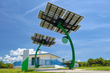 Solar photovoltaic panels mounted on city street pole for electricity supply of streetlights and...