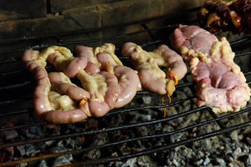 Cow bowels presented on a grill. Argentine Traditional cuisine.