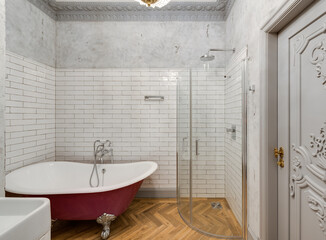 Grey bathroom with classic-style pink bathtub
