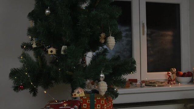 Decorated Christmas tree. Christmas background - baubles and branches