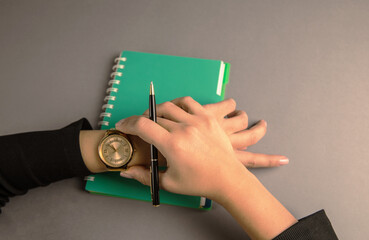 woman looking at her watch