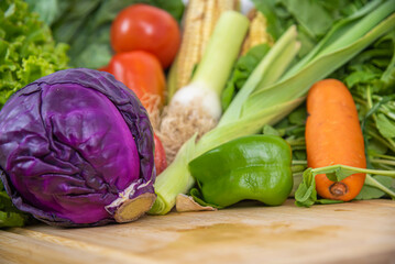 Red cabbage vegetable on top of chopping board