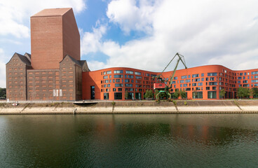 inside port with crane and curved building