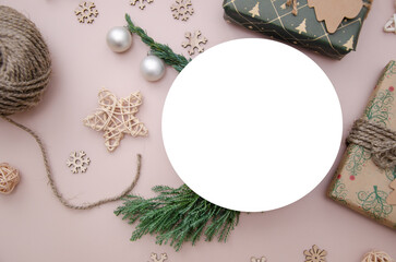 Christmas composition. Flat lay composition with Christmas decorations and white round ad space. Round mock up.