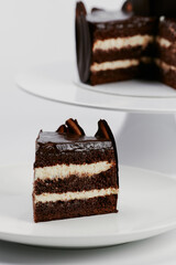 chocolate cake decorated with gold and berries