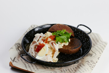 rye burger with salad and caviar