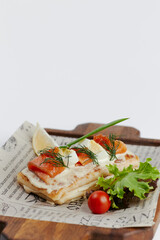 pancakes with vegetables and red fish