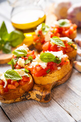 Italian bruschetta bread with tomato, basil and mozzarella cheese