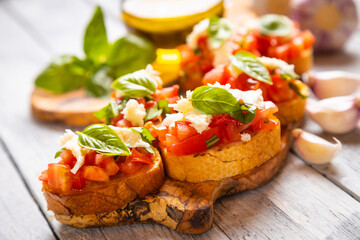 Italian bruschetta bread with tomato, basil and mozzarella cheese