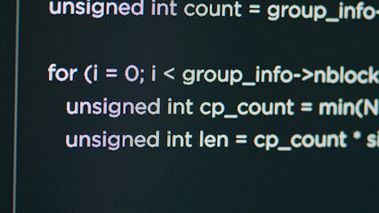Obraz premium Monitor display of system engineer typing source code on terminal window, creating software app with html script. Concept of software developer writing programming language. Close up.