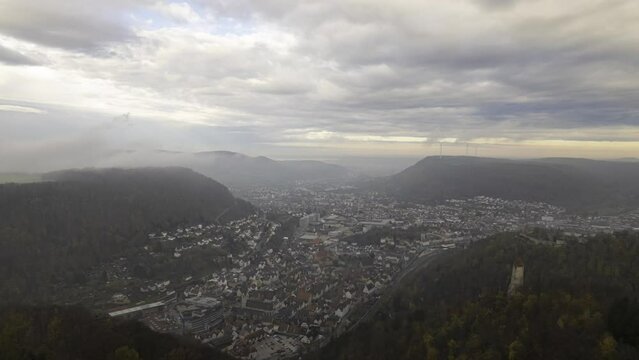Tower &Ouml;denturm, castle Helfenstein and city Geislingen on cloudy sunny morning time lapse