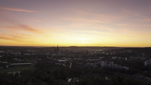 City center of Ulm from east while colorful dusk in autumn part 1 aerial time lapse
