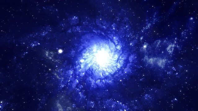 Flight to a spiral luminous blue galaxy through clusters of stars. Cosmic fantasy, a journey through the Milky Way. Colorful fractal nebula. High quality 4k footage